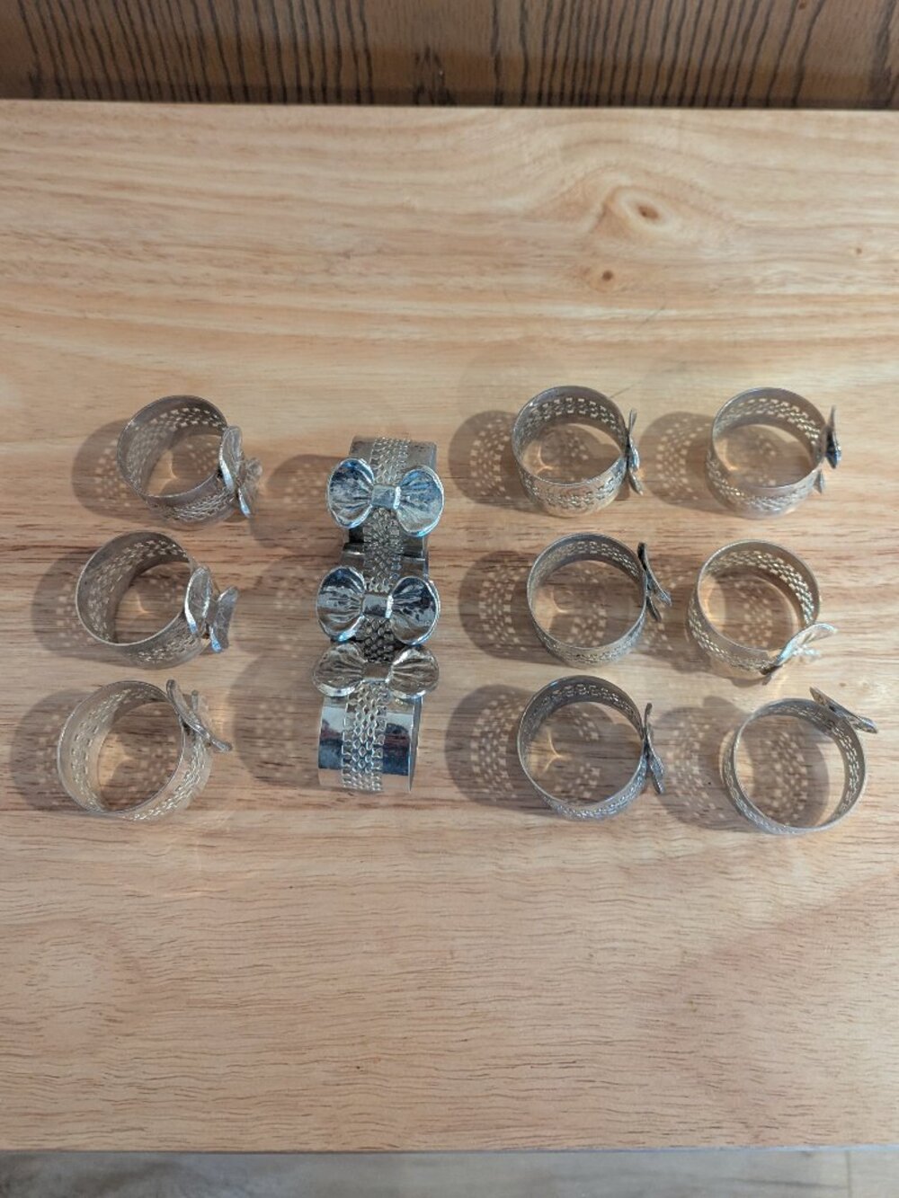 Vintage Set of 12 Silver (Plated ?) Napkin Rings-Bows & Filigree Like Detailing